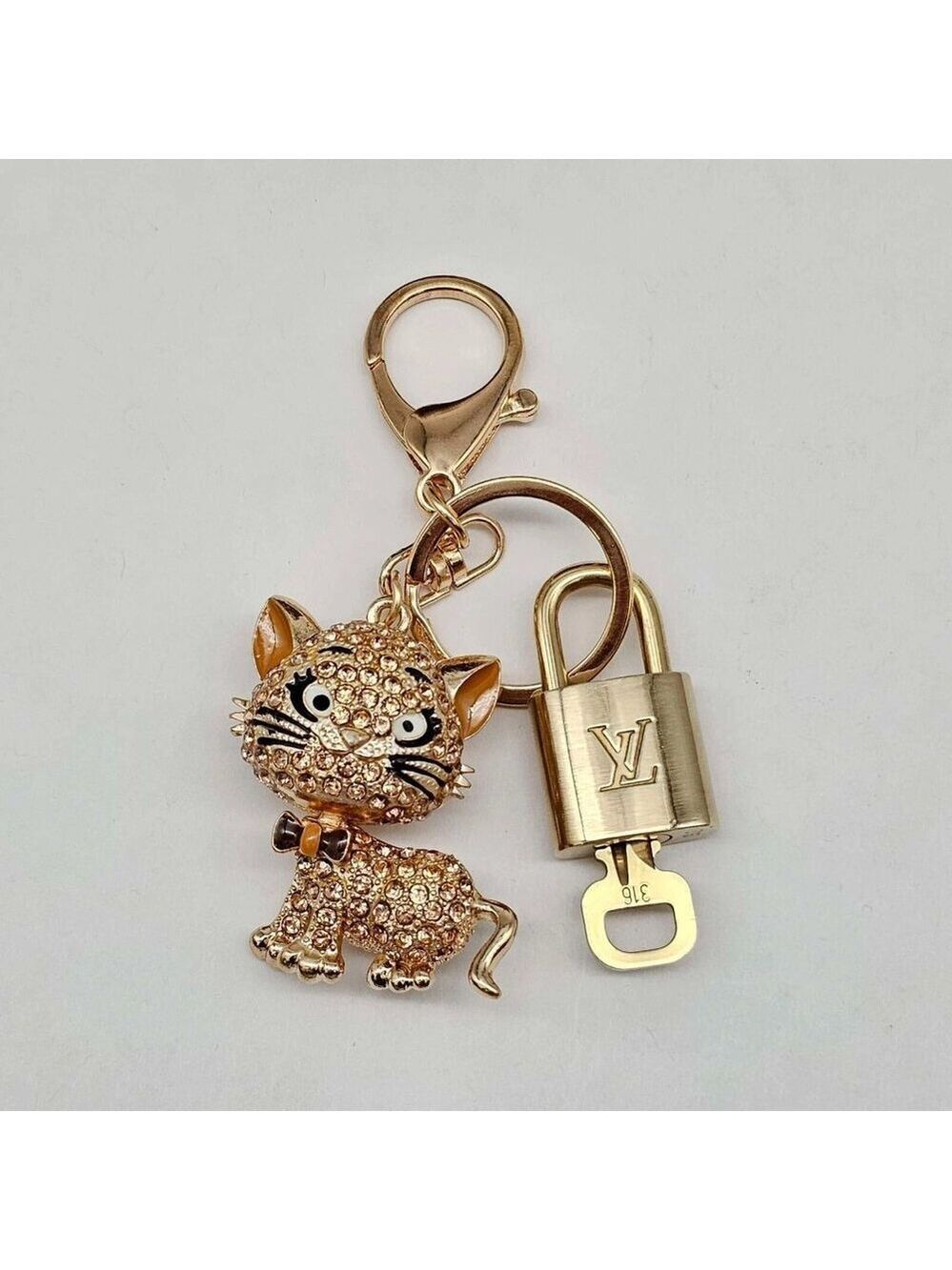 Authentic Louis Vuitton Lock & Key with unbranded Cat Bagcharm, Keycharm 010226